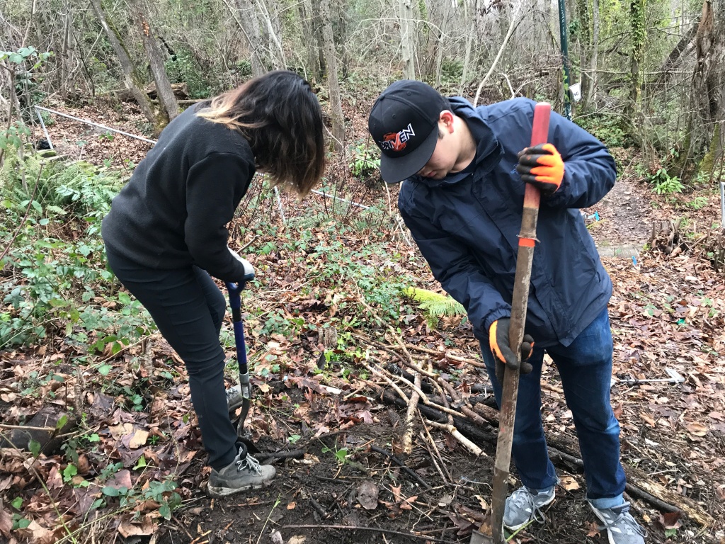 A picture containing outdoor, person, grass, tool
Description automatically generated