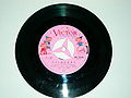 120px-Vinyl_records_single